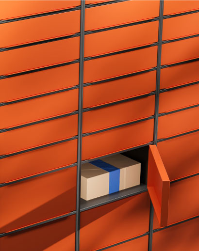 A box sits in an open orange mailbox in a mail room