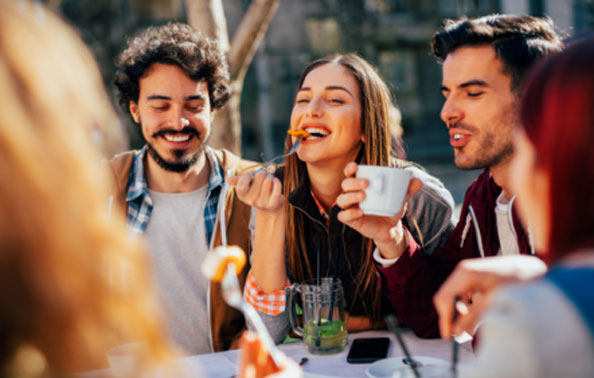 Three friends dining at a Parsippany restaurant